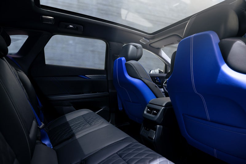 Back Seat View of the 2026 OPTIQ-V Blue Front Seats, Sun Roof, and Interior | D'Addario Cadillac in Shelton CT